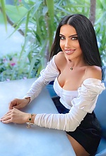 Ukrainian mail order bride Olena from Kiev with black hair and green eye color - image 2