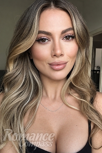 Ukrainian mail order bride Victoria from Munich with light brown hair and hazel eye color - image 1