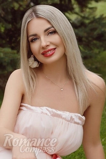 Ukrainian mail order bride Tatyana from Ivano-Frankivsk with blonde hair and blue eye color - image 1