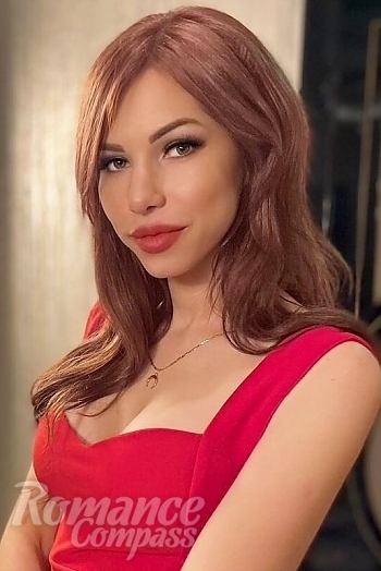 Ukrainian mail order bride Margarita from Sochi with red hair and brown eye color - image 1