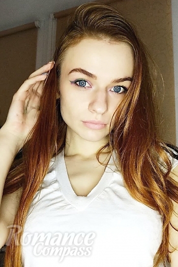 Ukrainian mail order bride Olena from Nizhyn with red hair and blue eye color - image 1