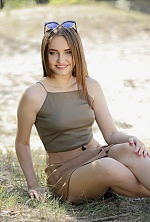 Ukrainian mail order bride Polina from Lubny with brunette hair and green eye color - image 11
