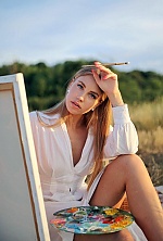 Ukrainian mail order bride Anastasia from Kiev with blonde hair and green eye color - image 5