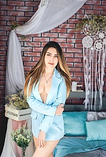Ukrainian mail order bride Anastasiya from Kyiv with brunette hair and blue eye color - image 8