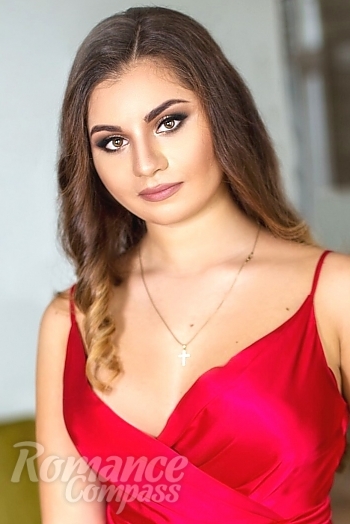 Ukrainian mail order bride Adele from Kyiv with black hair and blue eye color - image 1