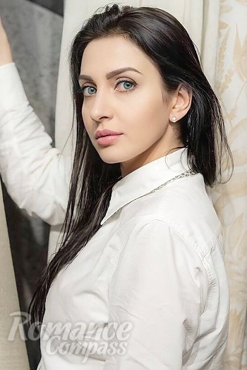 Ukrainian mail order bride Elena from Dnipro with brunette hair and green eye color - image 1
