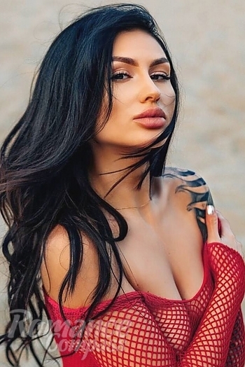 Ukrainian mail order bride Maria from Kiev with black hair and hazel eye color - image 1