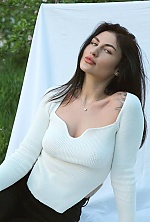 Ukrainian mail order bride Maria from Kiev with black hair and hazel eye color - image 11