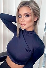 Ukrainian mail order bride Iulia from Bucharest with blonde hair and blue eye color - image 5