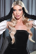 Ukrainian mail order bride Iulia from Bucharest with blonde hair and blue eye color - image 13