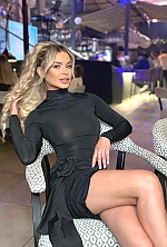 Ukrainian mail order bride Iulia from Bucharest with blonde hair and blue eye color - image 14