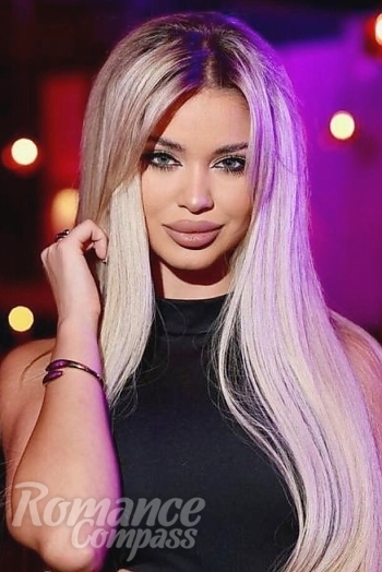 Ukrainian mail order bride Iulia from Bucharest with blonde hair and blue eye color - image 1