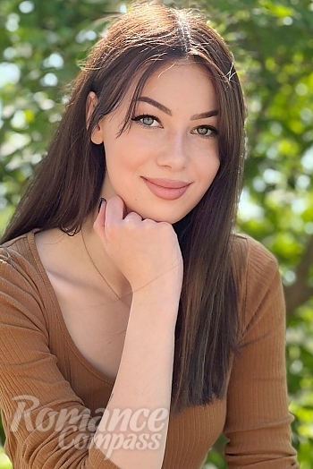 Ukrainian mail order bride Daria from Cherkassy with light brown hair and green eye color - image 1