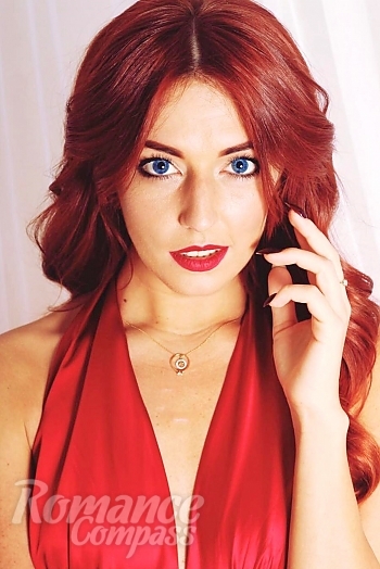 Ukrainian mail order bride Evgenya from Kiev with red hair and blue eye color - image 1