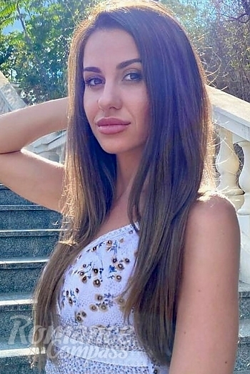 Ukrainian mail order bride Olga from Odessa with light brown hair and brown eye color - image 1