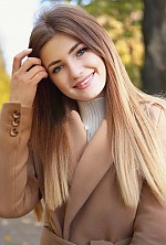 Ukrainian mail order bride Tetiana from Lviv with light brown hair and blue eye color - image 5