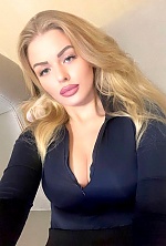 Ukrainian mail order bride Elizaveta from Kiev with light brown hair and blue eye color - image 9
