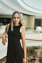 Ukrainian mail order bride Anastasia from Nikolaev with blonde hair and blue eye color - image 3