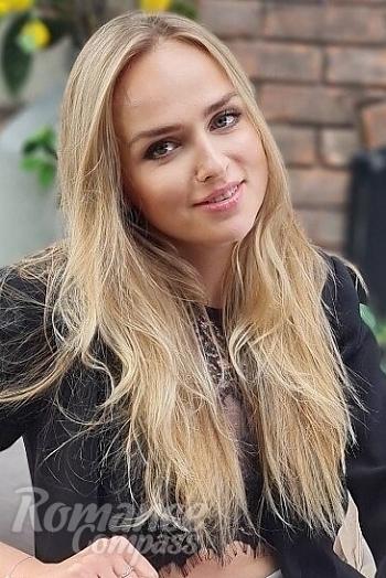 Ukrainian mail order bride Anastasia from Nikolaev with blonde hair and blue eye color - image 1