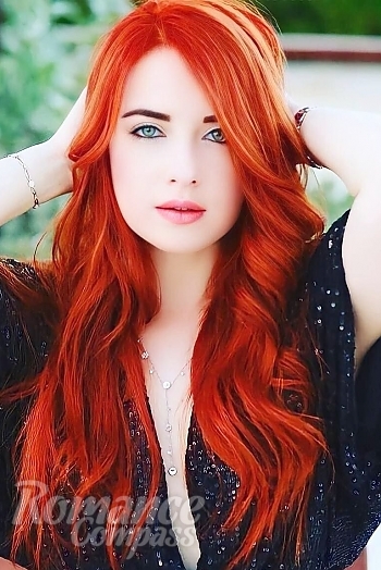 Ukrainian mail order bride Aleksandra from Dubai with red hair and green eye color - image 1