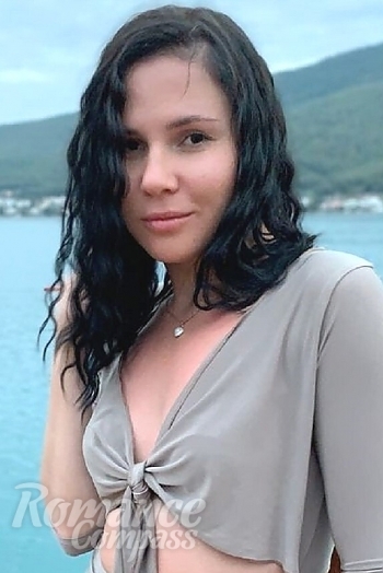 Ukrainian mail order bride Alona from Kyiv with black hair and brown eye color - image 1