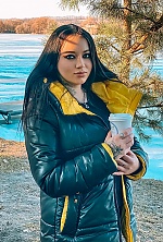 Ukrainian mail order bride Uliana from Khmelnytskyi with black hair and blue eye color - image 3