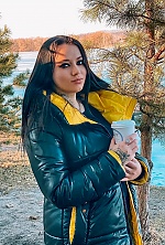 Ukrainian mail order bride Uliana from Khmelnytskyi with black hair and blue eye color - image 4