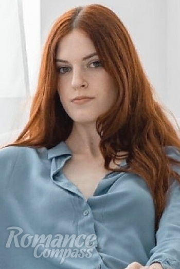 Ukrainian mail order bride Anna from Lviv with red hair and hazel eye color - image 1