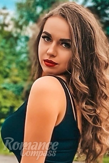 Ukrainian mail order bride Olya from Rivne with light brown hair and green eye color - image 1