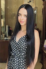 Ukrainian mail order bride Kristina from Kiev with black hair and green eye color - image 2