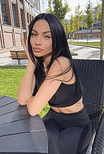 Ukrainian mail order bride Oksana from Kiev with black hair and brown eye color - image 11