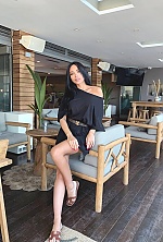 Ukrainian mail order bride Oksana from Kiev with black hair and brown eye color - image 4