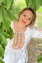Ukrainian mail order bride Olena from Nikolaev with light brown hair and green eye color - image 3