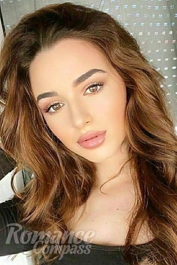 Ukrainian mail order bride Rita from Portimao with brunette hair and brown eye color - image 1