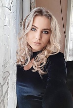Ukrainian mail order bride Ruslana from Lviv with blonde hair and blue eye color - image 7