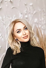 Ukrainian mail order bride Halyna from Berdyansk with blonde hair and grey eye color - image 14