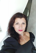 Ukrainian mail order bride Yulia from Kremenchug with black hair and brown eye color - image 8