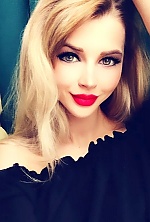 Ukrainian mail order bride Julia from Alexandria with blonde hair and green eye color - image 7