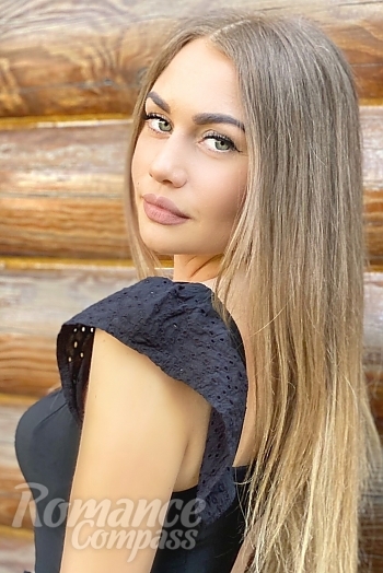 Ukrainian mail order bride Yana from Odessa with blonde hair and green eye color - image 1