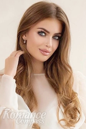 Ukrainian mail order bride Victoria from Kyiv with brunette hair and blue eye color - image 1
