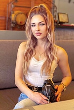 Ukrainian mail order bride Hanna from Lviv with light brown hair and green eye color - image 8