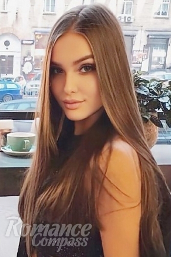 Ukrainian mail order bride Alina from Kyiv with light brown hair and blue eye color - image 1