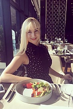 Ukrainian mail order bride Anastasia from Belarus with blonde hair and hazel eye color - image 3