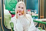 Ukrainian mail order bride Anastasia from Belarus with blonde hair and hazel eye color - image 9