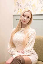 Ukrainian mail order bride Anastasia from Belarus with blonde hair and hazel eye color - image 6