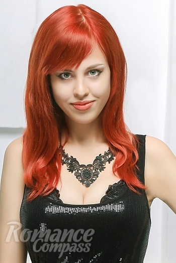 Ukrainian mail order bride Alisa from Kyiv with red hair and hazel eye color - image 1