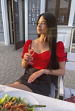 Ukrainian mail order bride Diana from Lviv with black hair and brown eye color - image 3