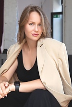 Ukrainian mail order bride Elizaveta from Lviv with light brown hair and blue eye color - image 5