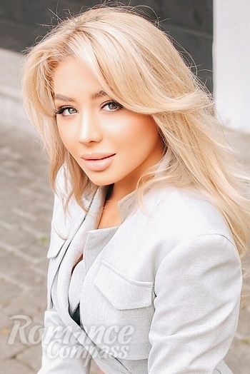 Ukrainian mail order bride Alina from Kishinev with blonde hair and green eye color - image 1
