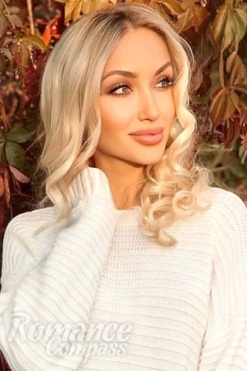 Ukrainian mail order bride Evgenia from Kiev with blonde hair and blue eye color - image 1